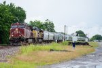A southbound Grain Train takes the connecting track onto the ex-MP Wagoner Sub 